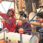 students with building tools