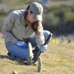 ranch worker with hat