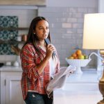 Woman_Speaking_into_Remote_Controlling_Lights (002)