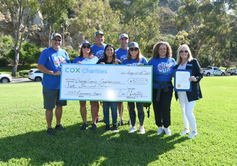 Cox Charities presented $5,000 check to OC Coastkeeper for Clean Up Program